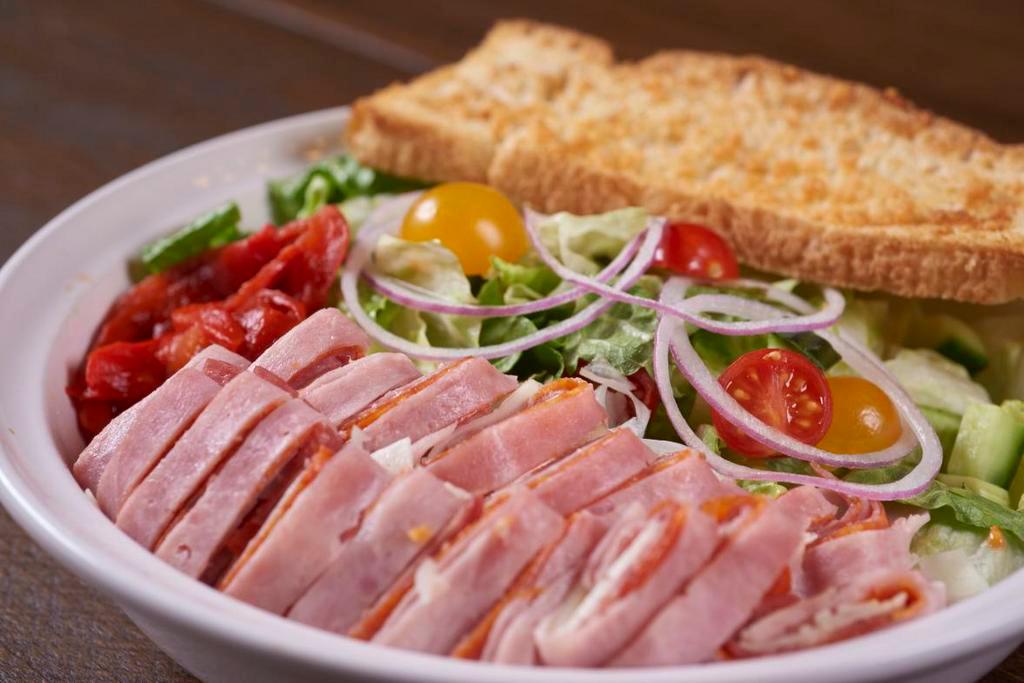 The Mean Green Antipasto Salad · It’s the clean green with roasted red peppers ham, salami, pepperoni and provolone cheese.