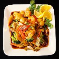 Happy Family · Fresh shrimp, beef, chicken, scallop and crab meat sauteed with mixed vegetables in brown sa...
