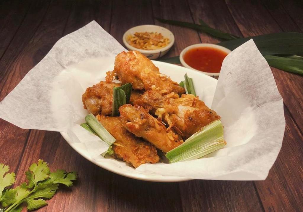 Had Yai Chicken Wings · Southern Thai fried chicken wing. Garlic, pepper, crispy shallot and spicy chili lime sauce.