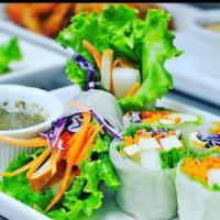 Thai Garden Roll ( Vegan ) · Thai garden roll. Rice wrapper, cucumber, carrot, lettuce, tofu, basil, mint and Thai chili ...