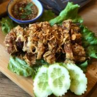 What Da Chic · Thai style fried chicken top with crispy shallot, spicy Thai BBQ sauce on the side served wi...