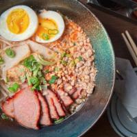Senn Tom Yum Noodle Soup (pork) · Spicy pork noodle soup. Thin rice noodles, Thai fish cake, ground pork, roasted pork, broile...