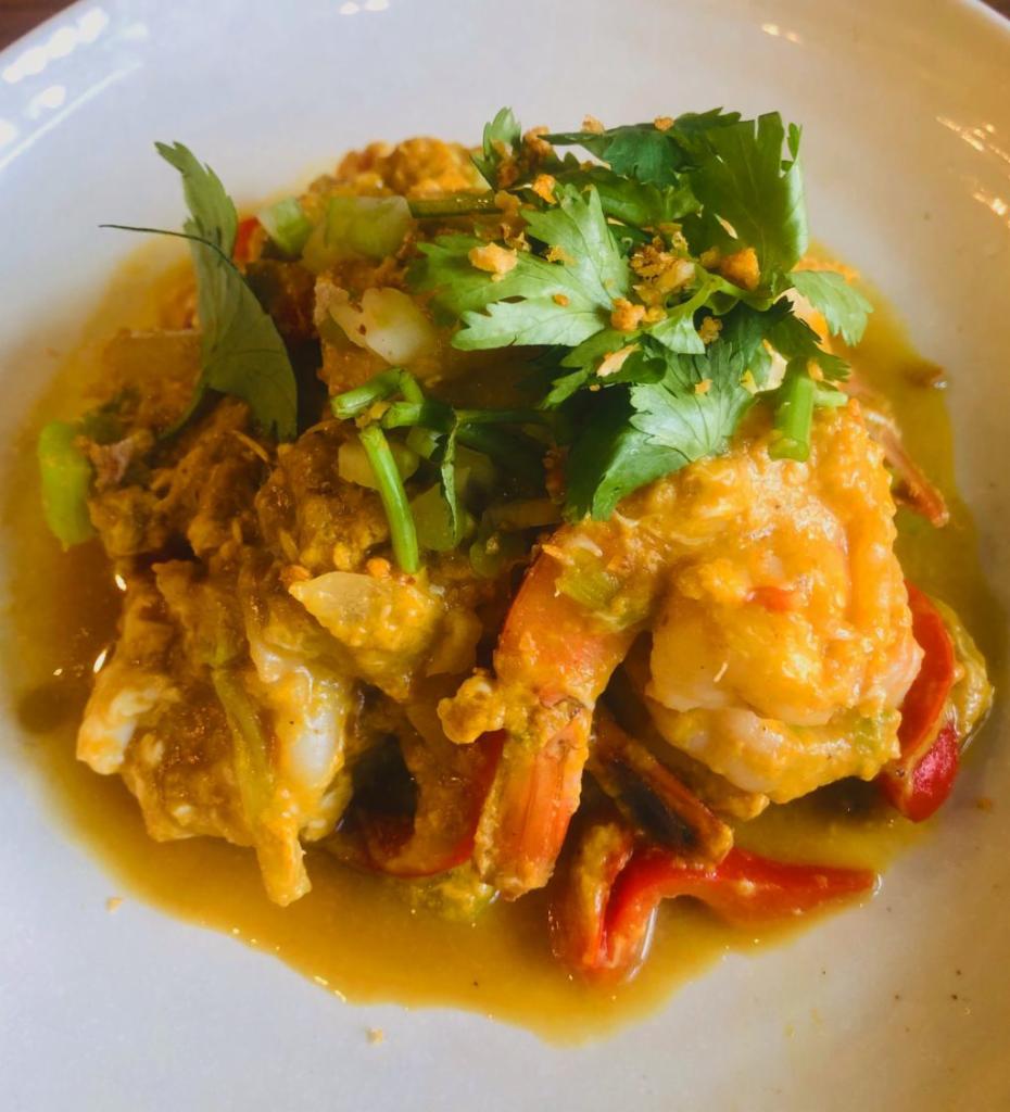 Pad Phong Karee  · Popular dish in Thailand, Shrimp sauteed with egg, curry powder, bell pepper, scallion, onion, Asian celery, served with jasmine rice. 