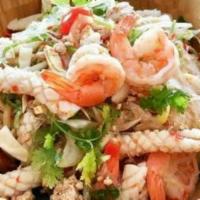 Yum Woon Sen (Glass Noodle Salad) · Shrimp, grounded pork, calamari, peanut, shallot, asian celery, thai chili-lime sauce.