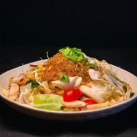 Pad Woonsen  · Stir-fried glass noodles , shiitake mushroom, cabbage, Asian celery, egg, tofu crouton, toma...