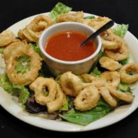 Calamares Fritos · Fried calamari. Tradicional aperitivo. Se ordena para tomarse el tiempo, mirar el menu and d...