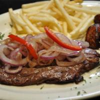 Vaco Encebollado · Flank steak with caramelized onions. Cebollas caramelizadas sobre un vacio cocido a la parri...