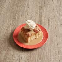 Bourbon Bread Pudding · Giant slice of old fashioned bread pudding with a generous serving of bourbon butter cream s...