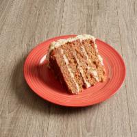 Carrot Cake for 2 · Thick slice of spiced cake and cream cheese frosting, served 7 layers high.