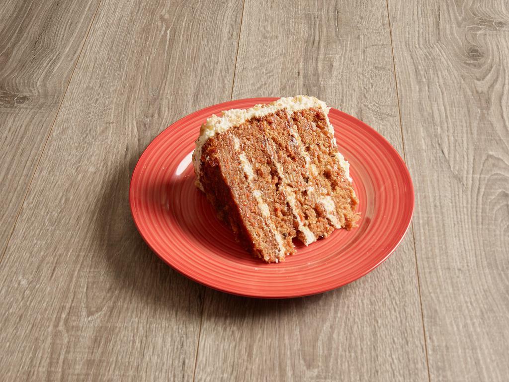Carrot Cake for 2 · Thick slice of spiced cake and cream cheese frosting, served 7 layers high.