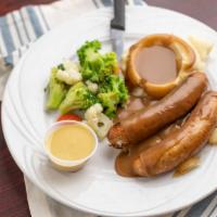 Benny Hill Bangers and Mash · 2 grilled savory English sausages, onions, mashed potatoes and gravy.