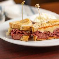 Tony Blair Ruben Sandwich · Corned beef, Swiss cheese and sauerkraut, served on rye with 1000 Island dressing.