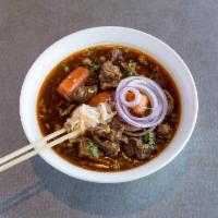 19. Hu Tieu Bo Kho · Rice noodles with beef stew.
