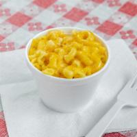 Macaroni and Cheese · Oven baked mac and cheese with a shredded blend of cheddar and Monterey Jack.