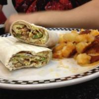 Breakfast Burrito · Egg, ham, bacon, onion, pepper and cheese. Served with choice of home fries or french fries.