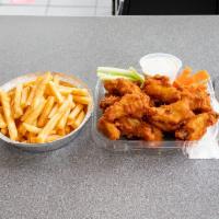 Buffalo Wings with Fries · Served with blue cheese.