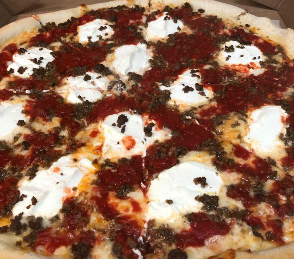 Lasagna Pizza · Ricotta with mozzarella cheese and ground beef.