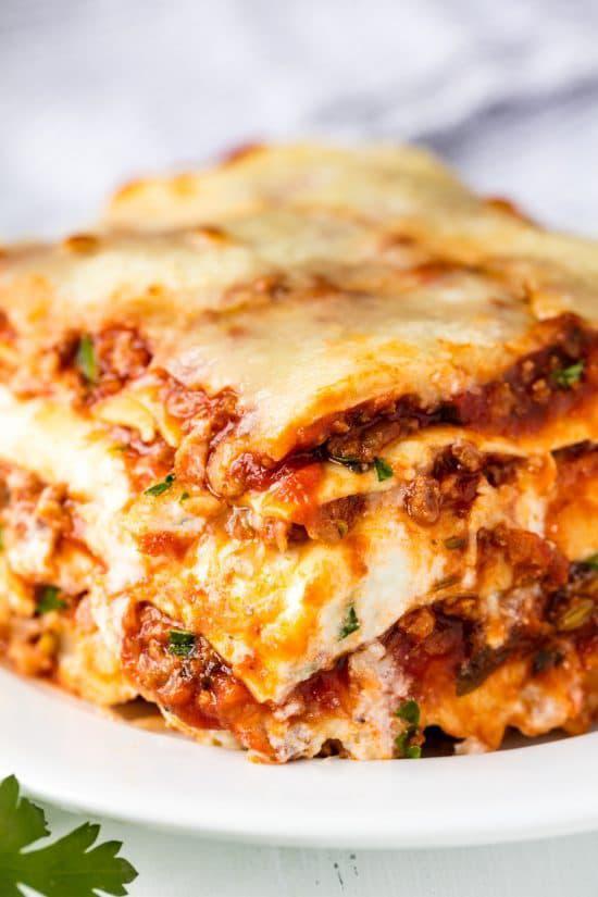 Lasagna · Served with salad, bread and Parmesan cheese and choice of pasta.