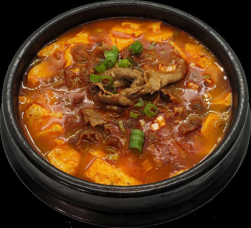 Tofu Stew with Rice · Korean silken tofu in a savory and spicy stew combines with various ingredients. Served with rice.