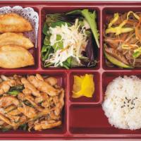Chicken Bulgogi Bento Box · Grilled and marinated chicken bulgogi. Served with rice, fresh seasonal salad, and stir-frie...