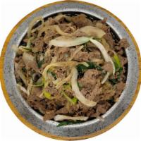3. Beef Bulgogi · Thin sirloin slices with onions in a classic Korean BBQ sauce.