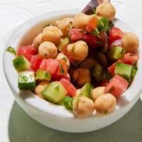 Side Chickpea Salad · Cooked chickpeas mixed with freshly chopped tomato, cucumber, onion, mint, parsley, and cila...