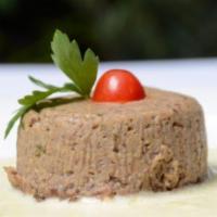 TIMBALLO DI FUNGHI CON FONDUTA E TARTUFO NERO   · Mushroom Souffle With Fontina Cheese Sauce And Black Truffles