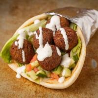 Falafel Gyro Combo · Includes french fries and a free can soda. Gyro comes with Lettuce, Tomato, Onion & White Sa...