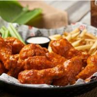 Combo Chicken Wings · Cooked wing of a chicken coated in sauce or seasoning.