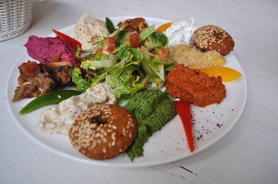 Mezza Plate · 3 falafel pieces, side of tabouli, hummus, tzatziki.