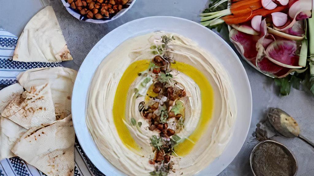 Hummus plate  · Hummus with pita bread 