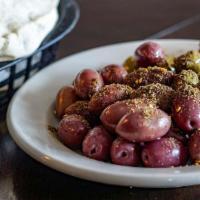 Marinated Olives · A house mix of Mediterranean olives. 