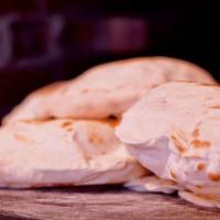 Pita Bread · Homemade and baked fresh to order.
