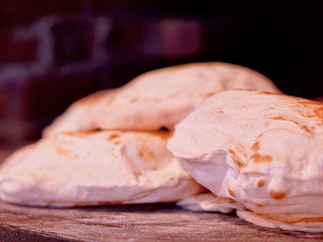 Pita Bread · Homemade and baked fresh to order.