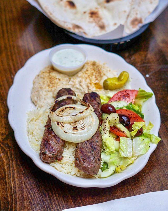 Kafta Kebab Platter · Ground lamb and beef seasoned with parsley, onions and spiced and grilled over charcoal. Served with pita, salad, rice, hummus and babaganouj.