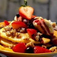 pancakes · strawberry, banana, granola, lemon curd, mascarpone & blueberry compote