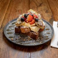 french toast · strawberry, caramelized banana, mascarpone & granola