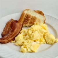 Scrambled Eggs and Bacon  · 2 fluffy eggs accompanied with 2 slices of crispy bacon