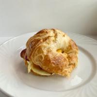 Bacon Egg and Cheese  · Fried egg with American cheese and Bacon on a croissant 