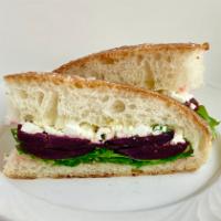 Beet & Goat Cheese Sandwich · Arugula, roasted beets, goat cheese, olive oil, salt, and pepper.