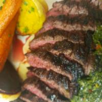 Grilled Hanger Steak · Chimichurri, brick oven roasted carrots, parsnips, and acorn squash.