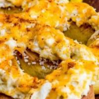 Crab Pretzel · Bavarian soft pretzel topped with eastern shore crab dip and shredded cheddar and parmesan c...