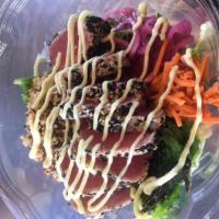 Ahi Power Bowl · Seared sesame encrusted Ahi tuna, seaweed salad, pickled red onions, pickled carrots, wasabi...