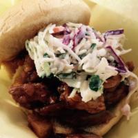 Mason Dixon Pulled Pork · House smoked pulled pork with sauteed granny smith apples & vidalia onions in a sweet & tang...