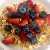 Greek Yogurt Parfait · Granola and berries.