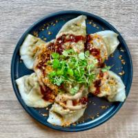 Shiitake Truffle Dumplings · Braised shiitake, baked tofu, spinach, dark soy, porcini mushrooms, chili panko, micro arugu...
