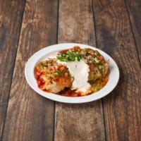 Padre Macho Burrito · Choice of meat, refried beans, rice, cheese, topped with sauce, guacamole, sour cream, tomat...
