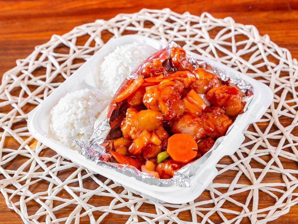 Sweet & Sour Chicken · Deep fried chicken sautéed with pineapple, onion, and green bell peppers in a sweet and sour sauce, served with rice.