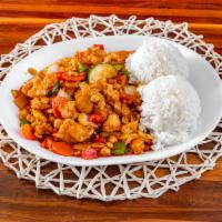 Kung Pao Chicken · Chicken sautéed with peas, carrots, zucchini, onion, water chestnuts, and bamboo shoots in a...