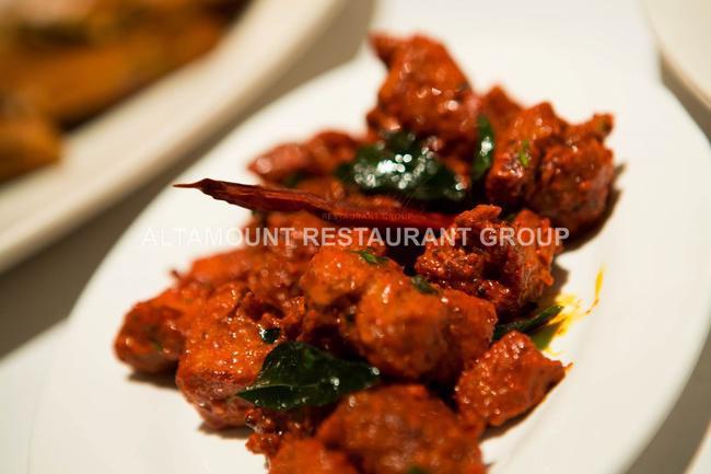 Chicken 65 (Chef's Special) · Famous Indian chicken appetizer made with boneless chicken spiced and deep fried.